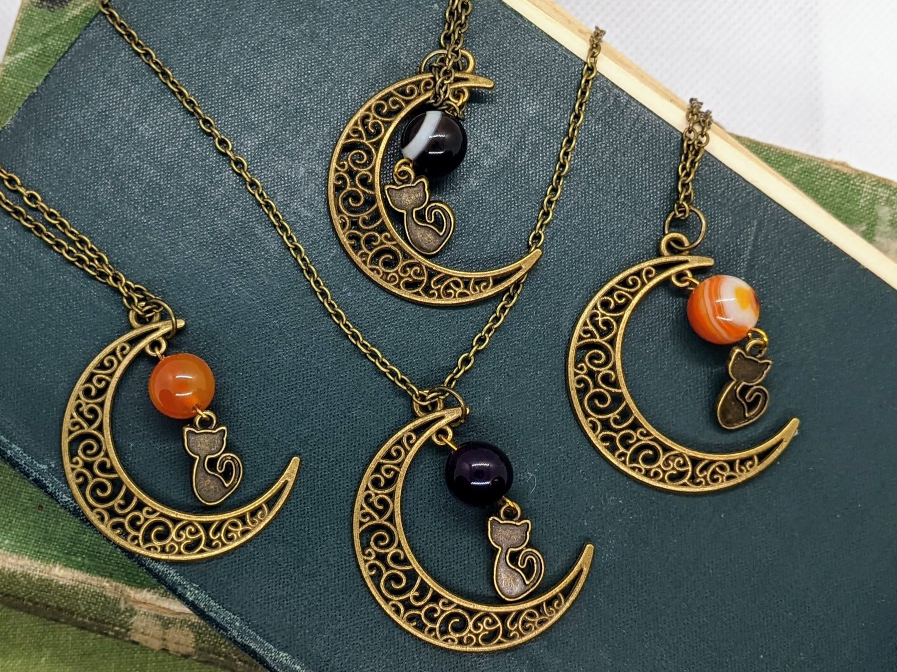 Celestial Feline: Bronze Moon Necklace with Cat Charm and Natural Stone